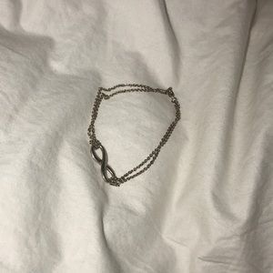 brand new, never worn tiffany infinity bracelet
